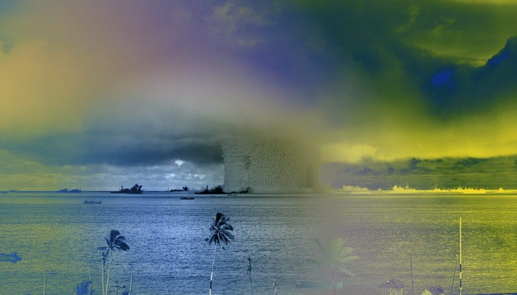 Grayscale Photo of Explosion on the Beach